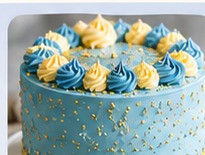 Blue and yellow celebration cake with buttercream details
